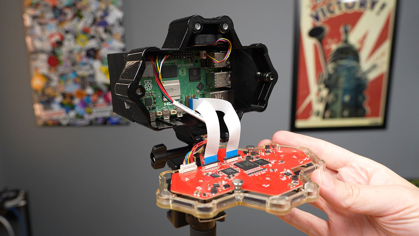 QuadRF open showing Raspberry Pi 5 and MIPI connection to FPGA antenna board inside