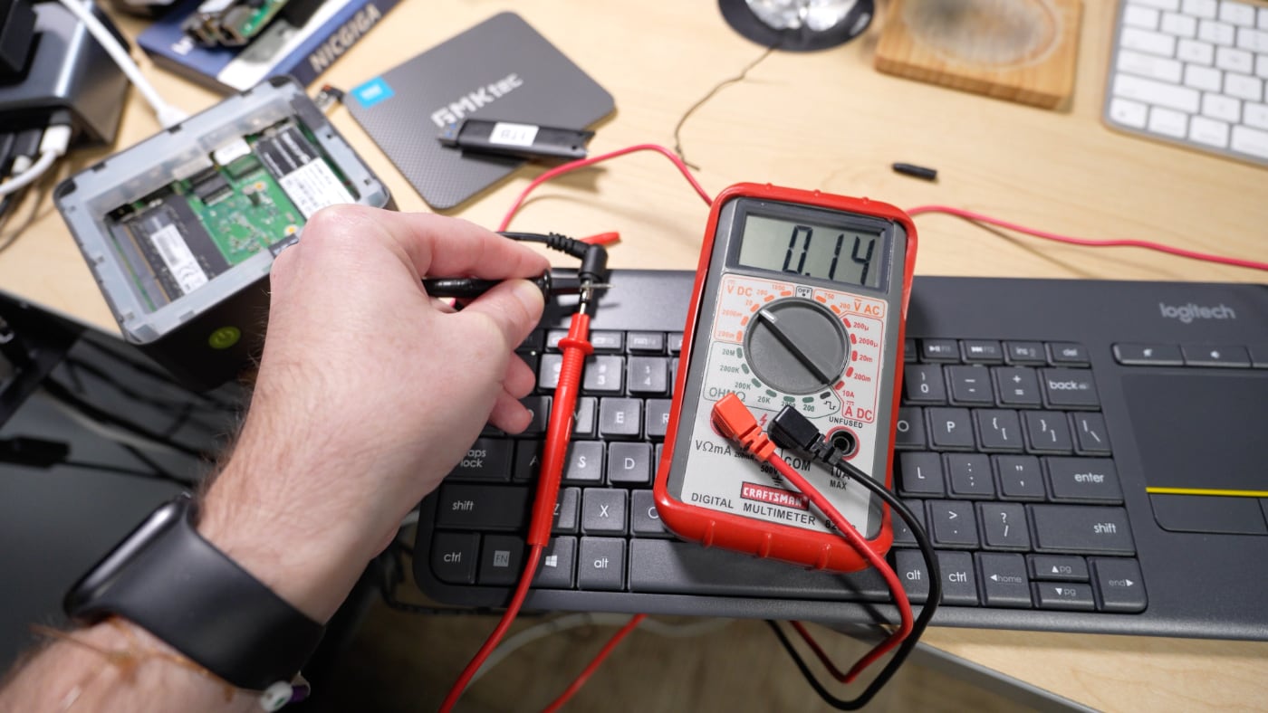 Measuring power on a broken barrel jack PSU with a multimeter